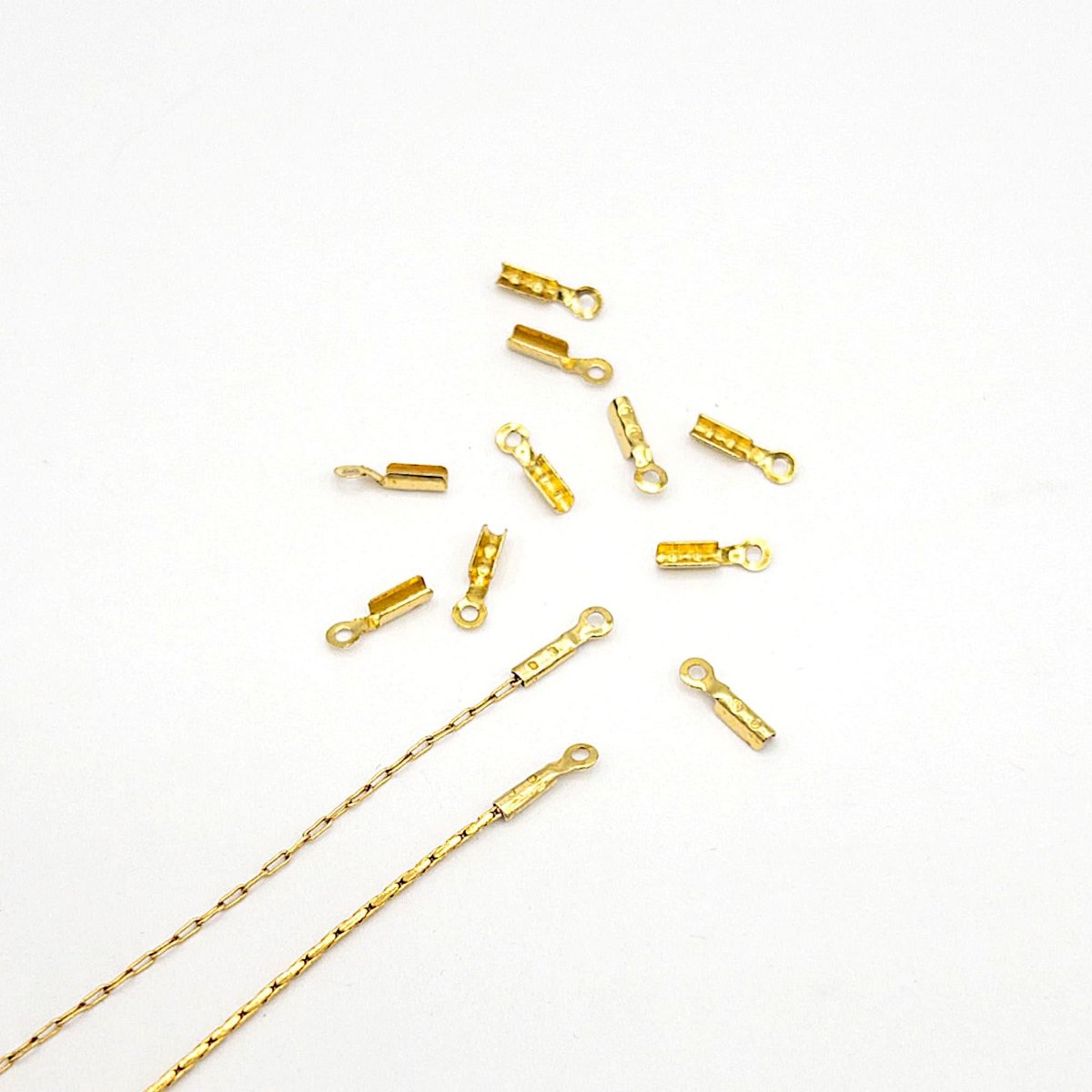 Crimp End Caps in Gold, Crimp Ends for 0.8mm Fine Chain, Cord End Caps, Fold Over End Caps in 18K Gold Plating and Stainless Steel (F001) - UniqueBeadsNY