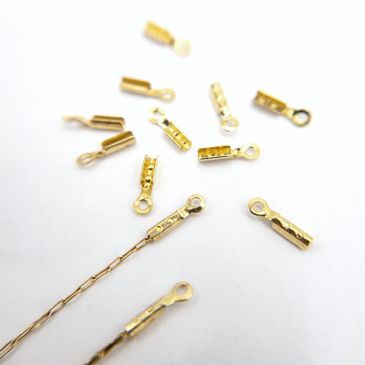 Crimp End Caps in Gold, Crimp Ends for 0.8mm Fine Chain, Cord End Caps, Fold Over End Caps in 18K Gold Plating and Stainless Steel (F001) - UniqueBeadsNY